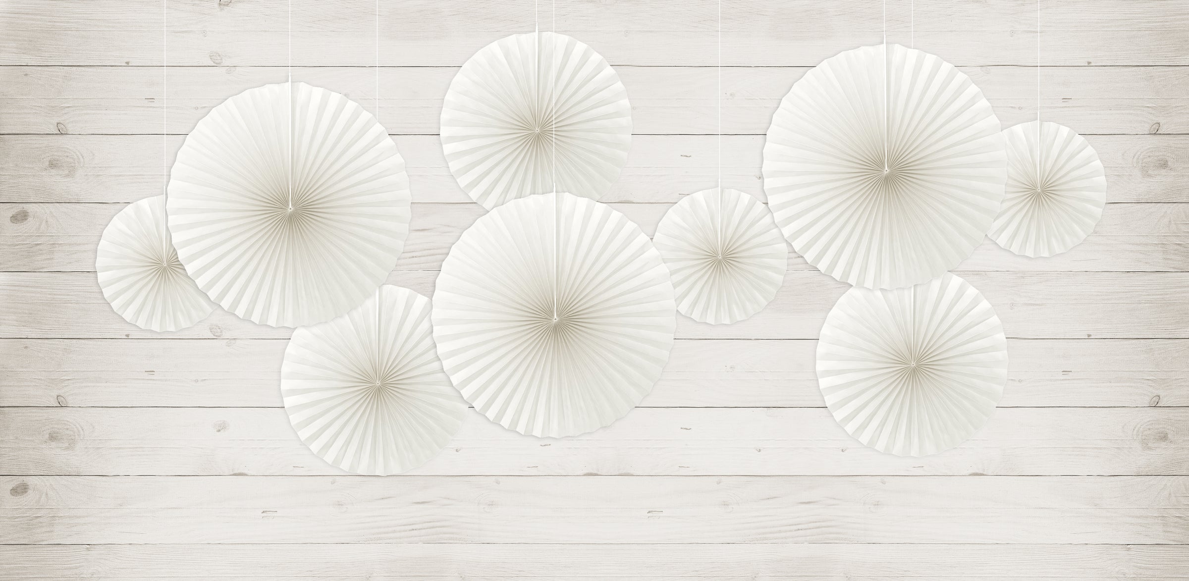 3 rosaces en papier blanc cassé