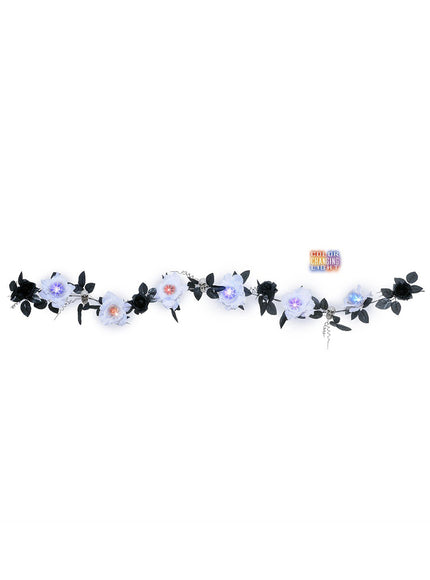 Guirlande de morts et roses blanches à lumière changeante