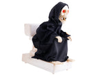 squelette moine sur toilettes lumineux sonore et motorisé 35cm